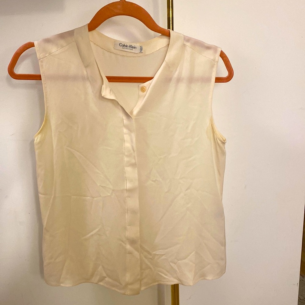 Calvin Klein off white silk blouse. Size 4.